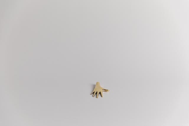 Hand Paperweight, Polished Brass